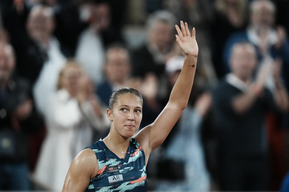 France's Diane Parry celebrates her win over Barbora Krejcikova of the Czech Republic in three sets, 1-6, 6-2, 6-3, during their first round match at the French Open tennis tournament in Roland Garros stadium in Paris, France, Monday, May 23, 2022. (AP Photo/Thibault Camus)