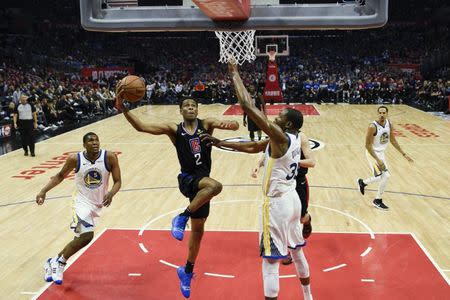 Apr 18, 2019; Los Angeles, CA, USA; Los Angeles Clippers guard Shai Gilgeous-Alexander (2) goes up for a shot while Golden State Warriors forward Kevin Durant (35) defends during the second half in game three of the first round of the 2019 NBA Playoffs at Staples Center. Mandatory Credit: Kelvin Kuo-USA TODAY Sports