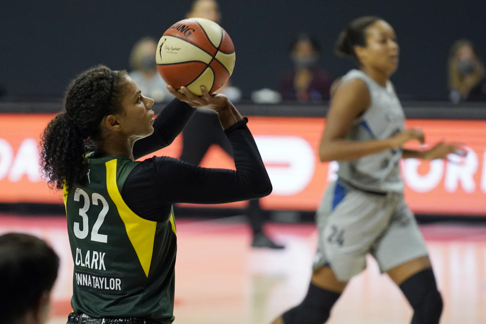 Seattle Storm forward Alysha Clark (32) shoots against the Minnesota Lynx during the second half of Game 2 of a WNBA basketball semifinal round playoff series Thursday, Sept. 24, 2020, in Bradenton, Fla. (AP Photo/Chris O'Meara)