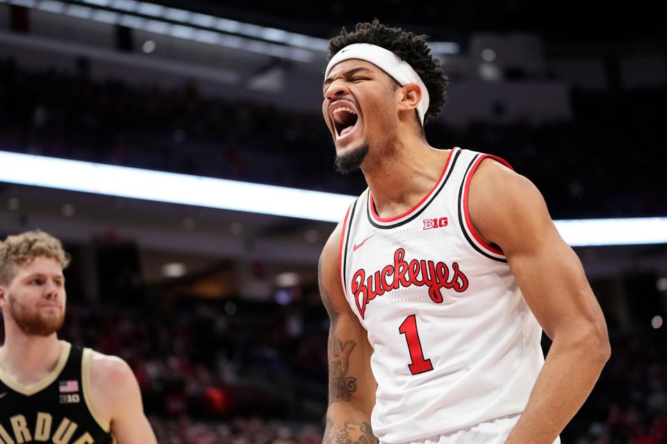 Feb 18, 2024; Columbus, Ohio, USA; Ohio State Buckeyes guard Roddy Gayle Jr. (1) reacts to a dunk during the first half of the NCAA men’s basketball game against the Purdue Boilermakers at Value City Arena.