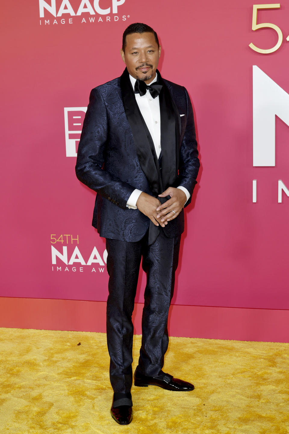 Terrence Howard wearing suit