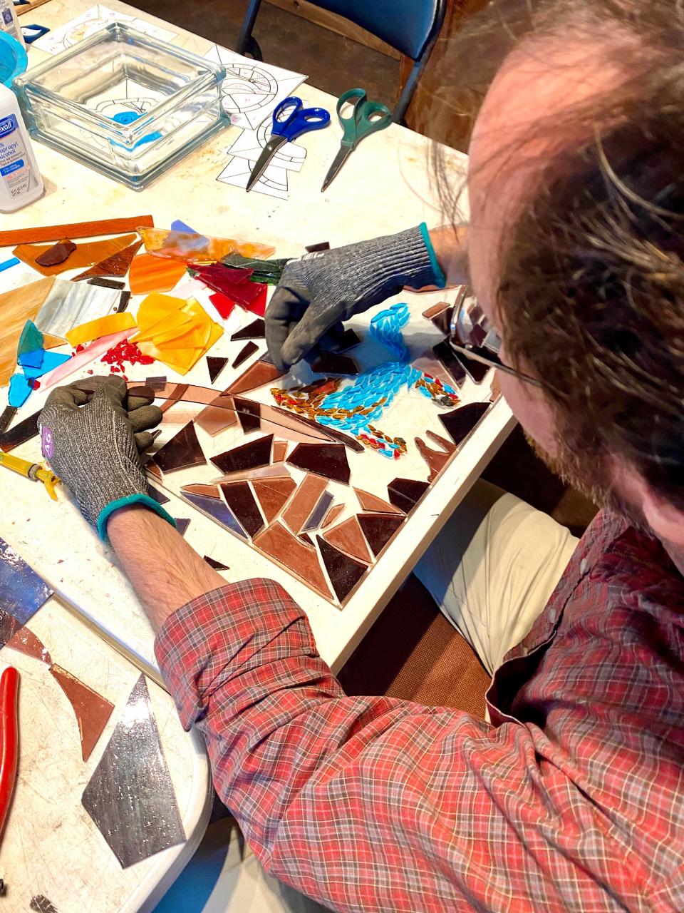 Justin Maddox participates in a stained-glass class on May 25, 2023, in Elba, Alabama.