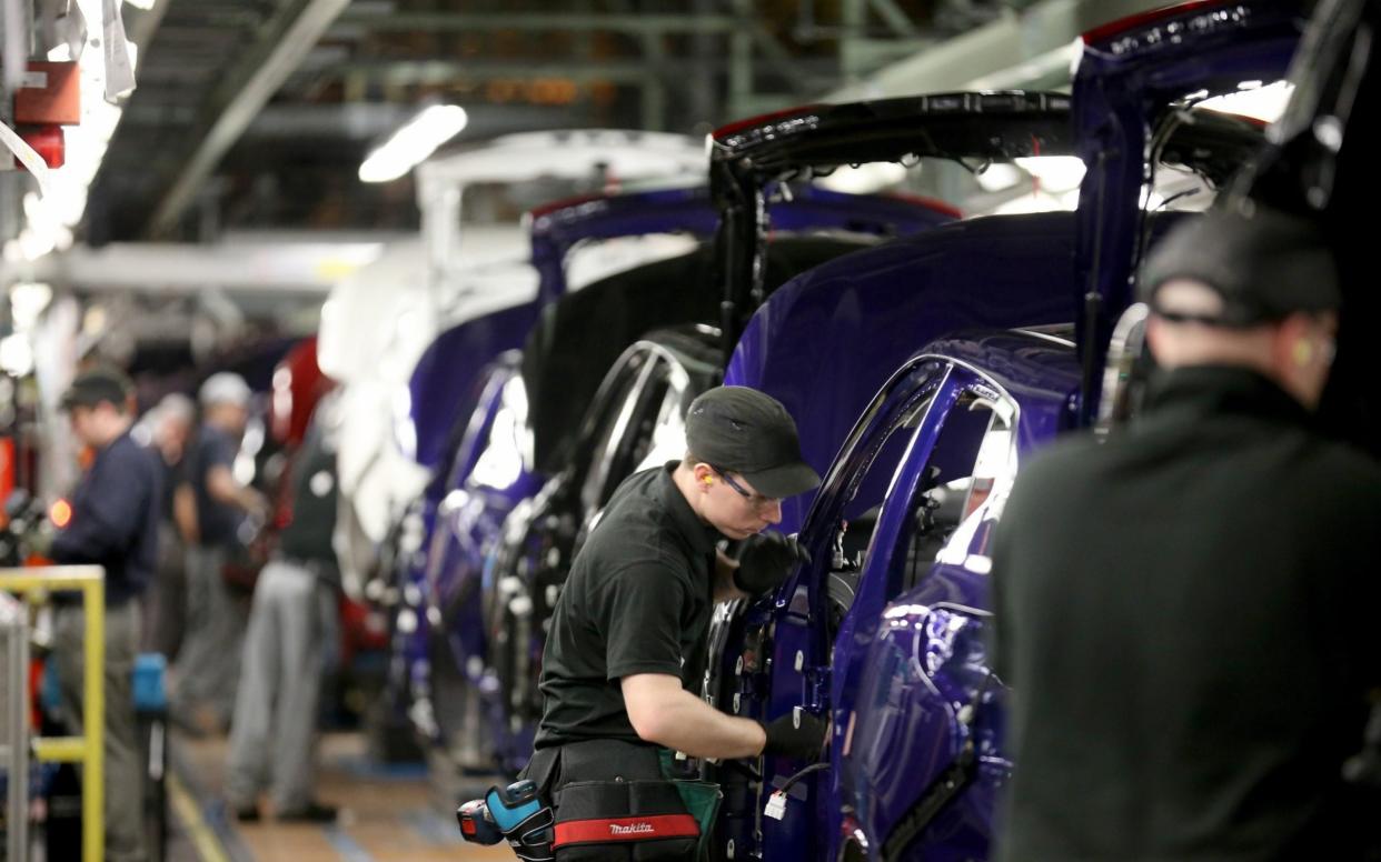Nissan cars rolling off the production line in Sunderland.  - Getty Images