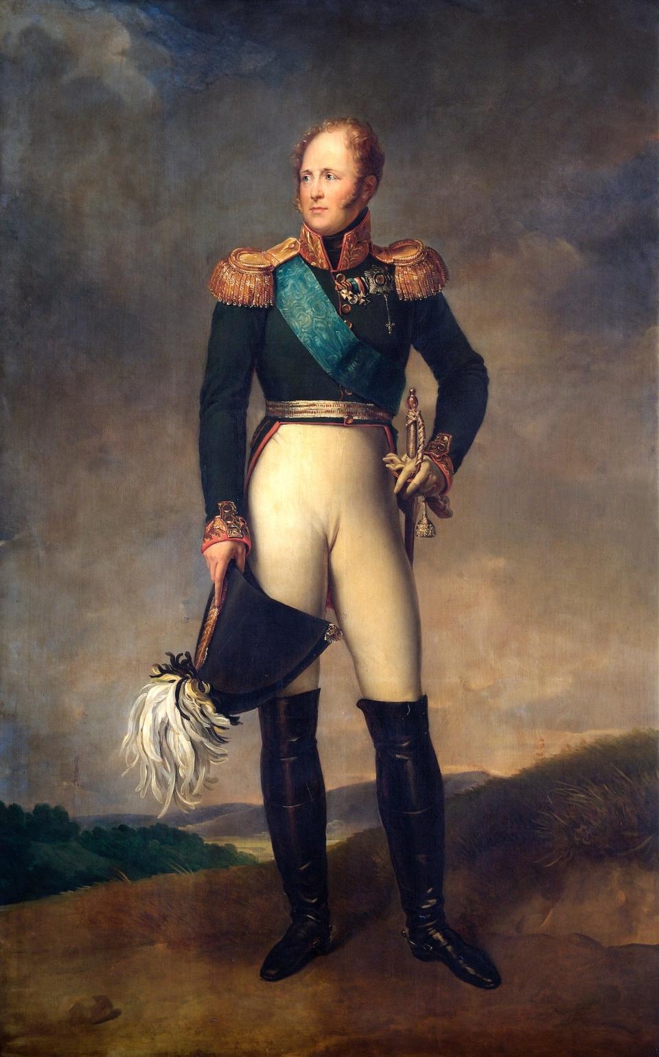 Portrait of Tsar Alexander I of Russia standing with his left hand on the hilt of his sword, his left hand hanging by his side holding his hat.