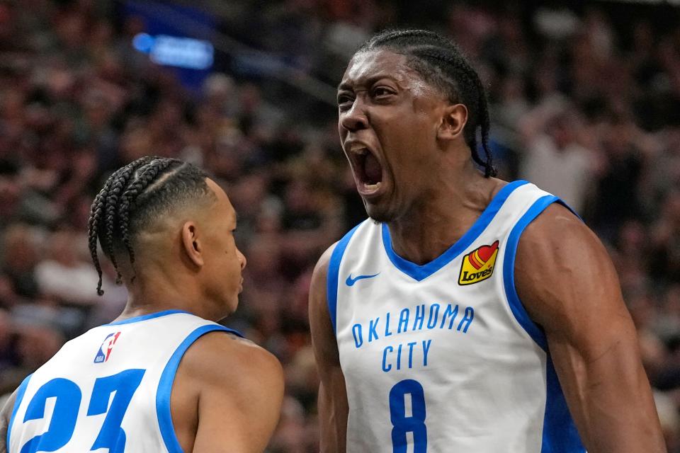 Thunder forward Jalen Williams (8) celebrates with Tre Mann (23) after a dunk against the Jazz in the first half of Monday's NBA Summer League game in Salt Lake City.