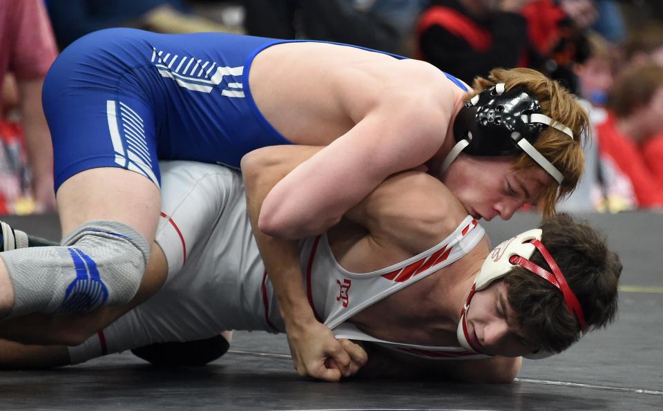 Dundee's Braden Broderick works toward a technichal fall over Jace Vavul of Constantine during Dundee's 49-22 victory in the Division 3 state wrestling semifinals on Saturday, Feb. 24, 2024.