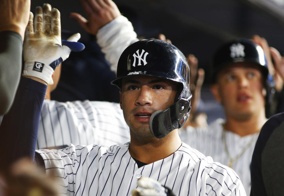 Aug 12, 2019; Bronx, NY, USA; New York Yankees shortstop Gleyber Torres (25) is congratulated after hitting a three run home run against the Baltimore Orioles during the fifth inning of game two of a doubleheader at Yankee Stadium. Mandatory Credit: Andy Marlin-USA TODAY Sports