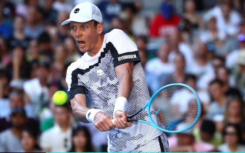 Tomas Berdych of Czech Republic plays a backhand in his first round match against Kyle Edmund of Great Britain during day one of the 2019 Australian Open at Melbourne Park on January 14, 2019 in Melbourne, Australia. - Credit: Getty Images&nbsp;