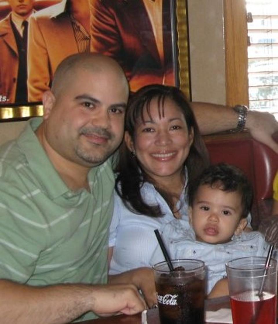 John Collado with his wife Amarilis and their son John Jay (Courtesy of Collado family)