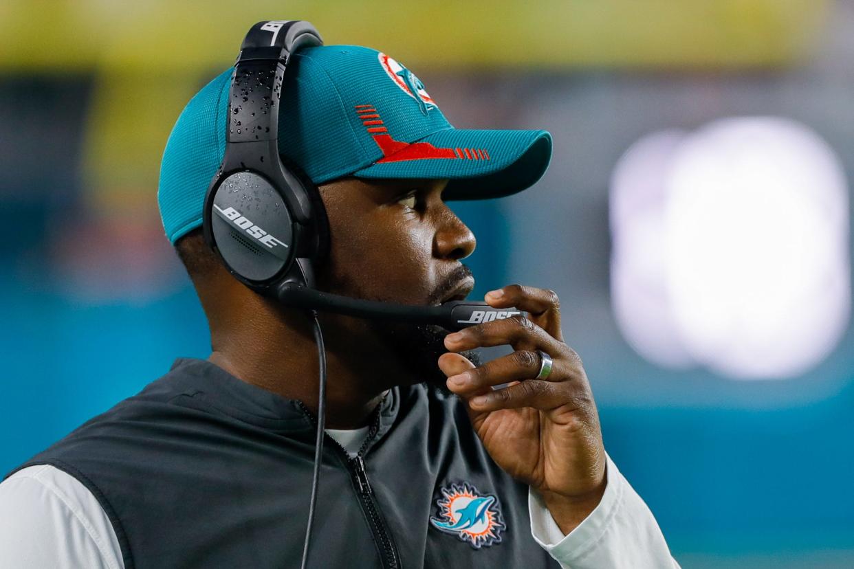 Could Brian Flores become the next Arizona Cardinals' head coach? His ties to the team's new general manager have people talking.