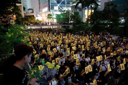 Anti-extradition bill protesters attend a rally calling on the British and U.S. governments to monitor the implementation of "one country two systems" principal, in Hong Kong