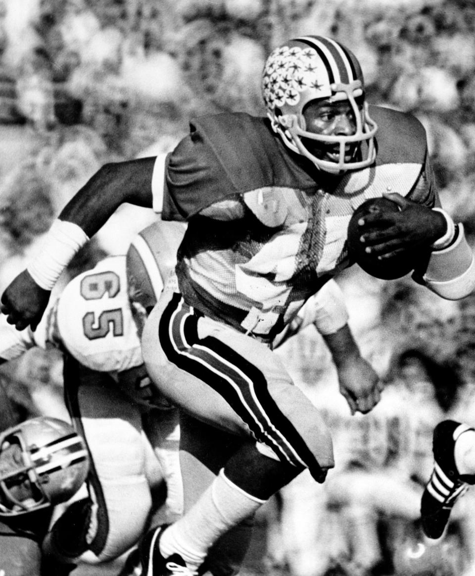 Ohio State's tailback Archie Griffin sprints towards the endzone during a game with Illinois, on November 2, 1974, in Columbus, Ohio. The 22 yard run put the young athlete over the 100 yard rushing mark for the 18th straight game, thus setting a new college record.