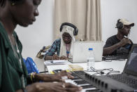 Students compose a music at a beat making class for women in Dakar, Senegal, Wednesday, Aug. 14, 2024. (AP Photo/Annika Hammerschlag)