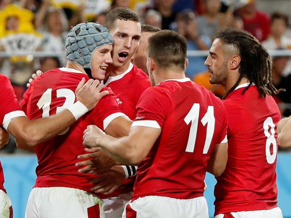 Wales' Jonathan Davies celebrates scoring: REUTERS