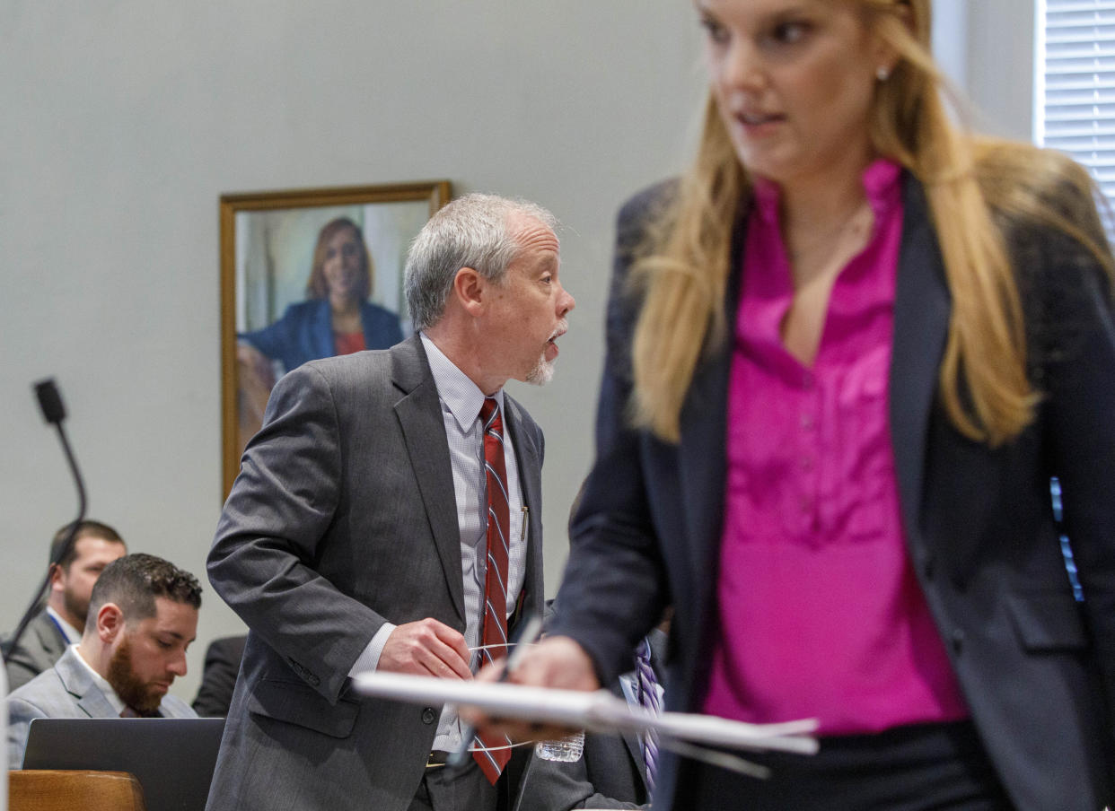 Prosecutor Creighton Waters and defense attorney Margaret Fox wrap up questions for the defense witness in the Alex Murdaugh trial at the Colleton County Courthouse in Walterboro, S.C., on Wednesday, Feb. 22, 2023. The 54-year-old attorney is standing trial on two counts of murder in the shootings of his wife and son at their Colleton County, S.C., home and hunting lodge on June 7, 2021. (Grace Beahm Alford/The Post And Courier via AP, Pool)