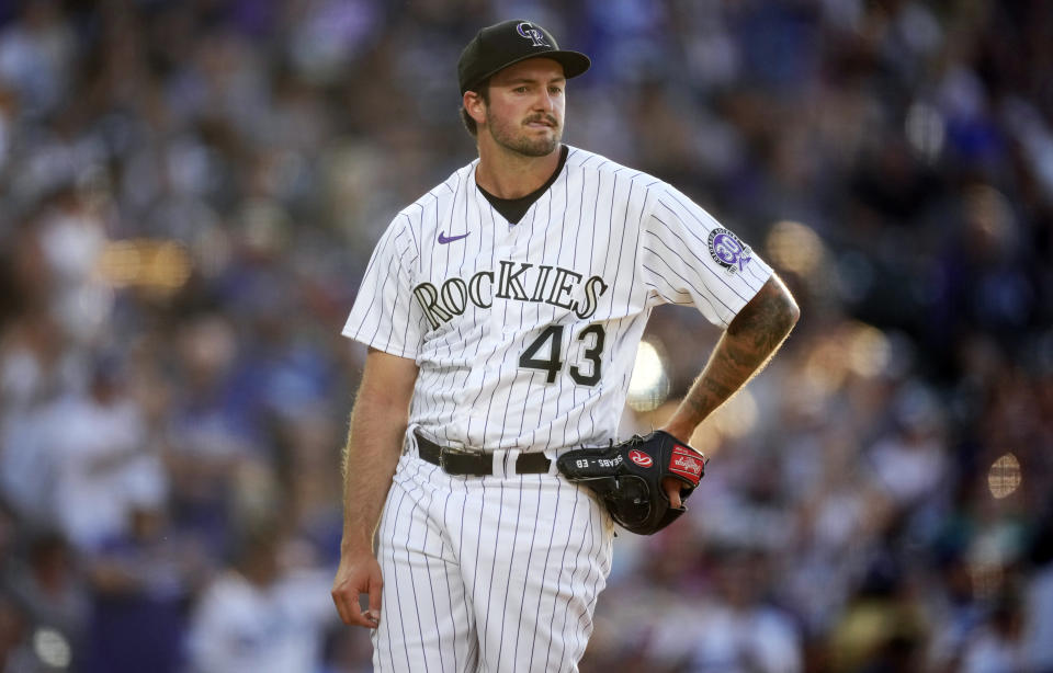 Colorado Rockies starting pitcher Connor Seabold reacts after giving up a two-run home run to Los Angeles Dodgers' J.D. Martinez in the third inning of a baseball game Tuesday, June 27, 2023, in Denver. (AP Photo/David Zalubowski)