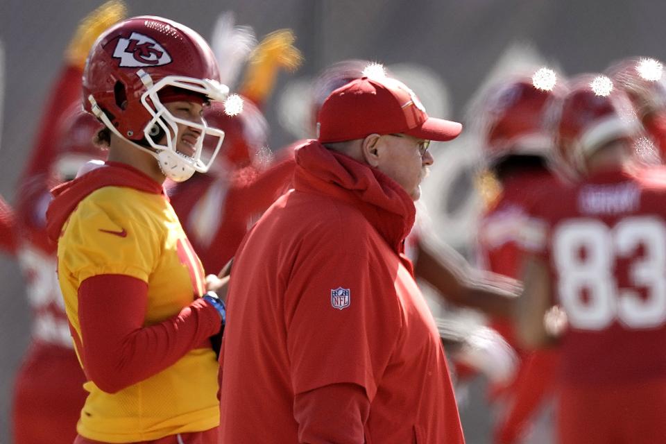 Kansas City Chiefs quarterback Patrick Mahomes, right, and head coach Andy Reid watch practice for Super Bowl Friday, Feb. 9, 2024 in Henderson, Nev. The Chiefs will play in the NFL title game against the San Francisco 49ers Sunday in Las Vegas. | Charlie Riedel, Associated Press