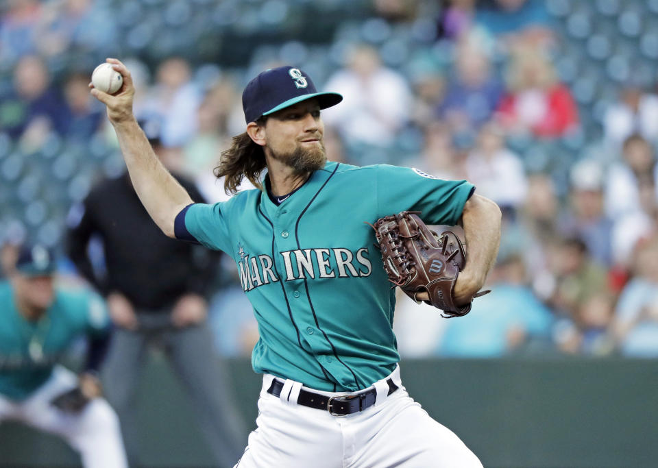 Mariners' right-hander Mike Leake  bounced back from worst career start to throw near perfect game against the Angels. (AP Photo/Ted S. Warren)