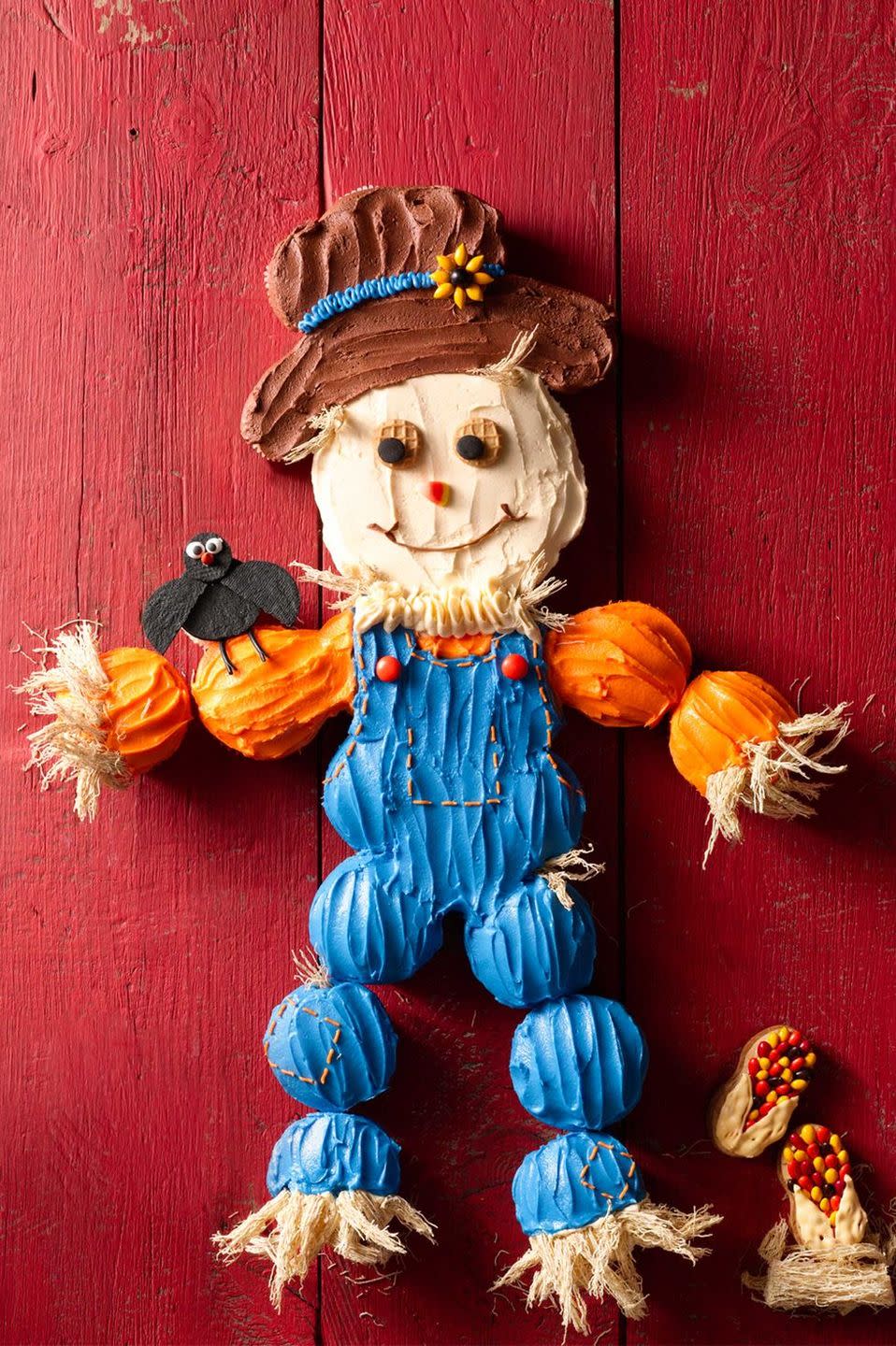 <p>Have fun crafting this playful scarecrow that doubles as both decoration and dessert.</p><p><strong><em><a href="https://www.womansday.com/food-recipes/food-drinks/recipes/a56159/cupcake-scarecrow-recipe/" rel="nofollow noopener" target="_blank" data-ylk="slk:Get the Cupcake Scarecrow recipe.;elm:context_link;itc:0;sec:content-canvas" class="link ">Get the Cupcake Scarecrow recipe. </a></em></strong> </p>