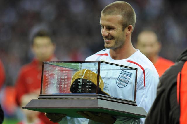 The LA Galaxy midfielder was presented with a commemorative cap by Sir Bobby Charlton 