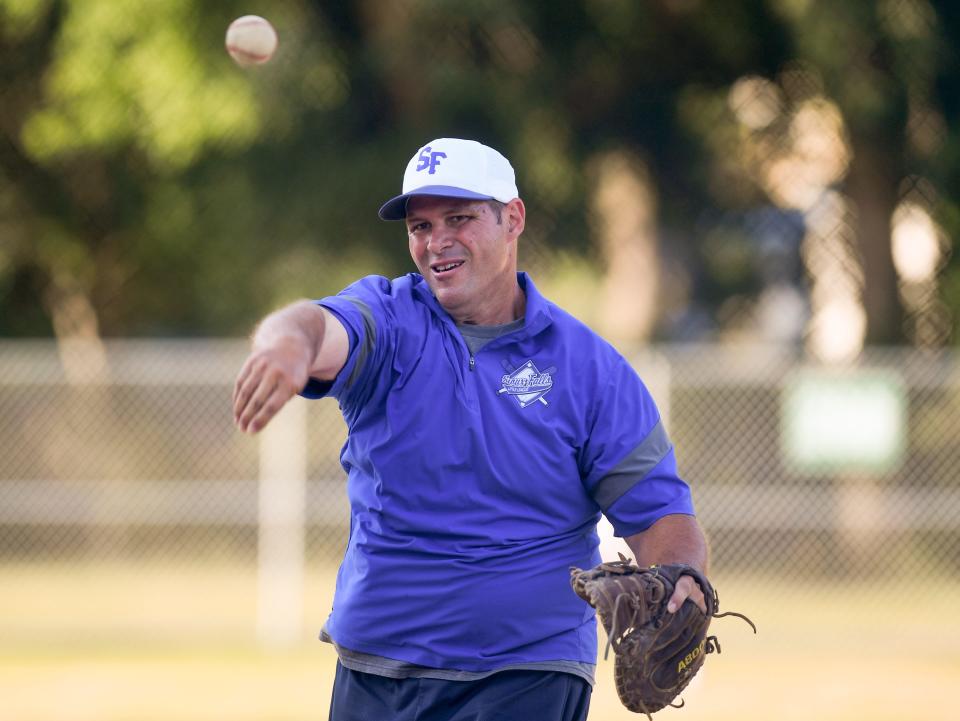 Coach Joe Rempp throws a pitch during Little League batting practice on Monday, August 1, 2022, at Cherry Rock Park in Sioux Falls.