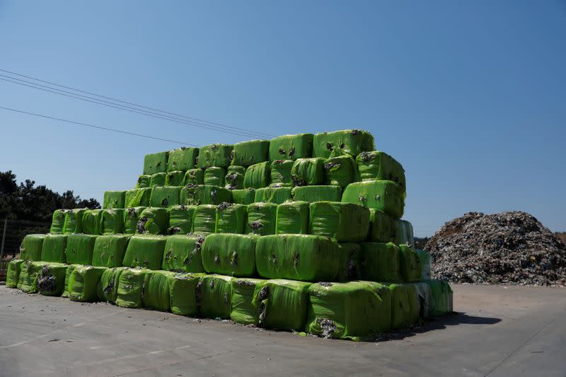 Packages of a plastic waste are seen at Extruplas plant in Seixal