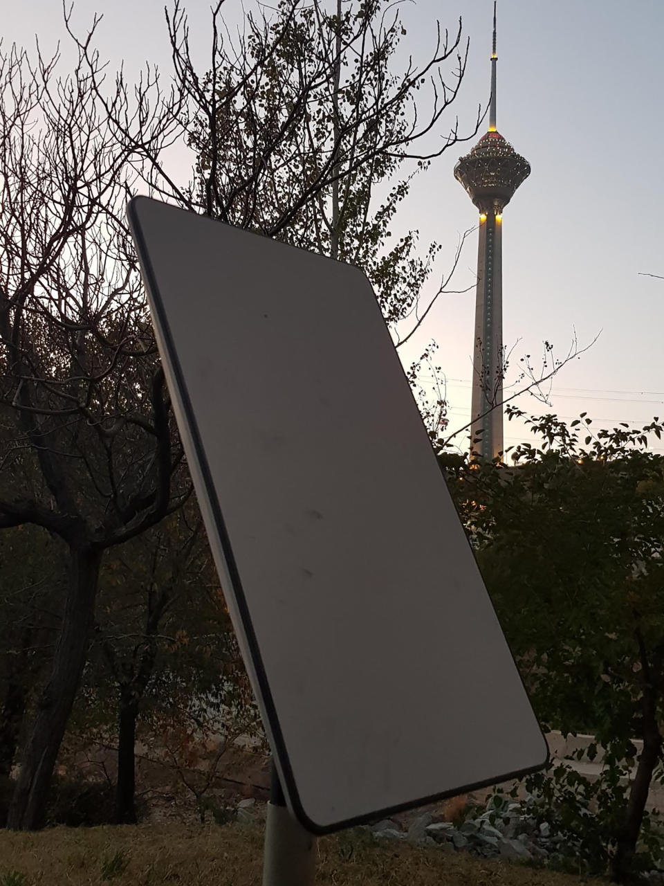 A Starlink dish in Tehran, with the iconic Milad Tower in the background photographed in early November. Activists inside Iran looked for photo sites that could communicate that the dishes were in fact there.<span class="copyright">Courtesy</span>