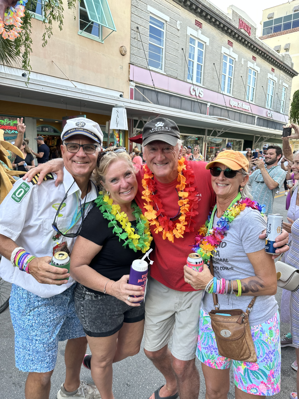 Key West club president (left) Eddie Kertis with fellow club members Dania Billman, Gregg Billman and Joanne Kertis during the city's second-line procession to commemorate Jimmy Buffett. (Eddie Kertis) 