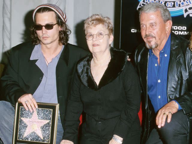 <p>Steve Granitz/WireImage</p> Johnny Depp with his parents, Betty Sue and John, at his Walk of Fame ceremony in November 1999.