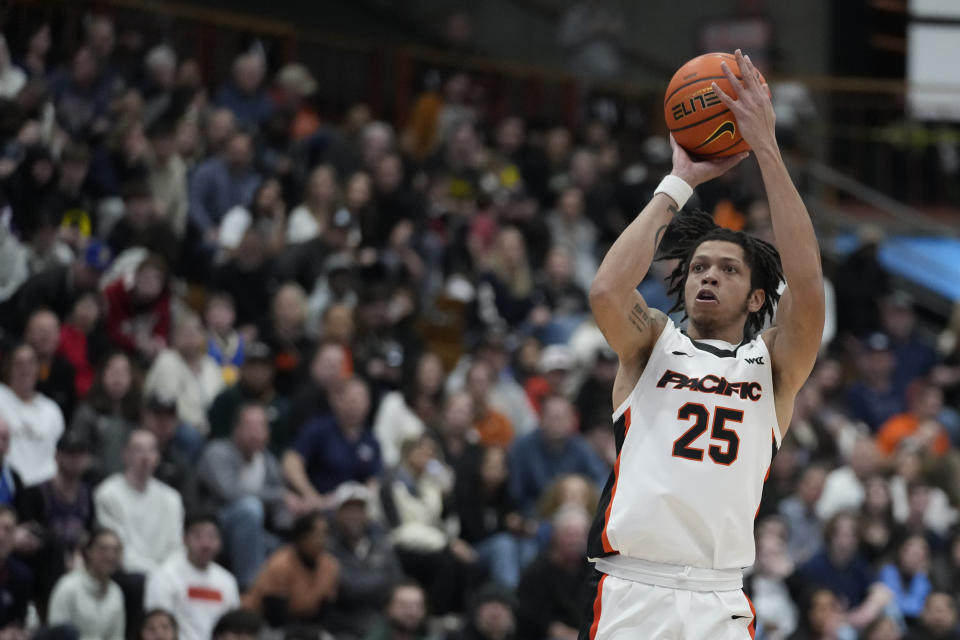 Pacific guard Nick Blake shoots a 3-point basket against Gonzaga during the first half of an NCAA college basketball game in Stockton, Calif., Saturday, Jan. 21, 2023. (AP Photo/Godofredo A. Vásquez)