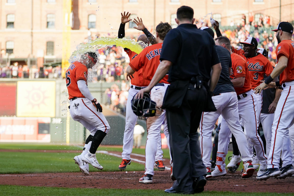 Baltimore Orioles - Jorge Mateo and Adam Frazier meet at second