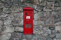 FILE PHOTO: A vintage red post box is seen in West Malling