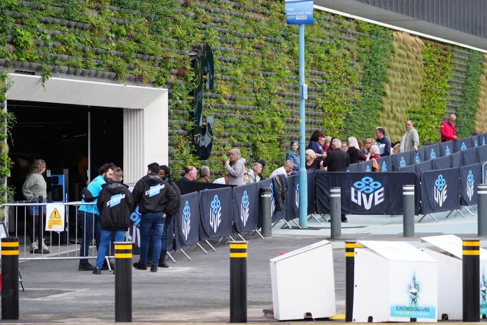 Concert goers arriving at the Co-op Live in Manchester for the Elbow concert. The troubled arena said it has completed an inspection and will open after a string of delays. The biggest indoor arena in the UK postponed its opening show after part of its ventilation and air conditioning system fell to the ground from the ceiling during a soundcheck. Picture date: Tuesday May 14, 2024.