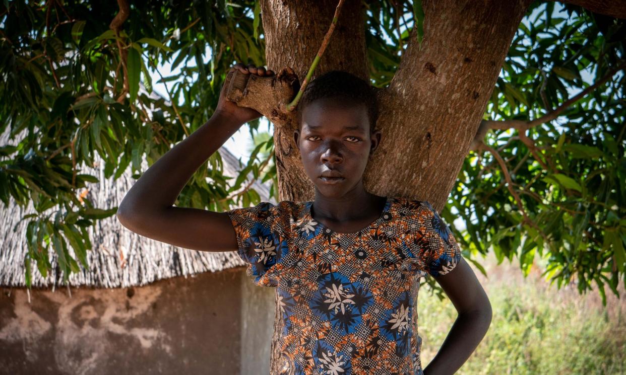 <span>Tabo Yowan, 17, suffers from nodding syndrome and does not have access to anti-epileptic medication. The disorder killed her sister</span><span>Photograph: Florence Miettaux/The Guardian</span>