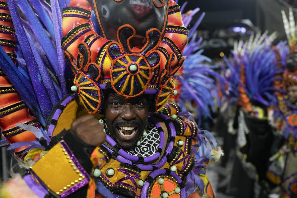 A performer from the Salgueiro samba school parades during Carnival celebrations at the Sambadrome in Rio de Janeiro, Brazil, early Monday, Feb. 12, 2024. (AP Photo/Silvia Izquierdo)
