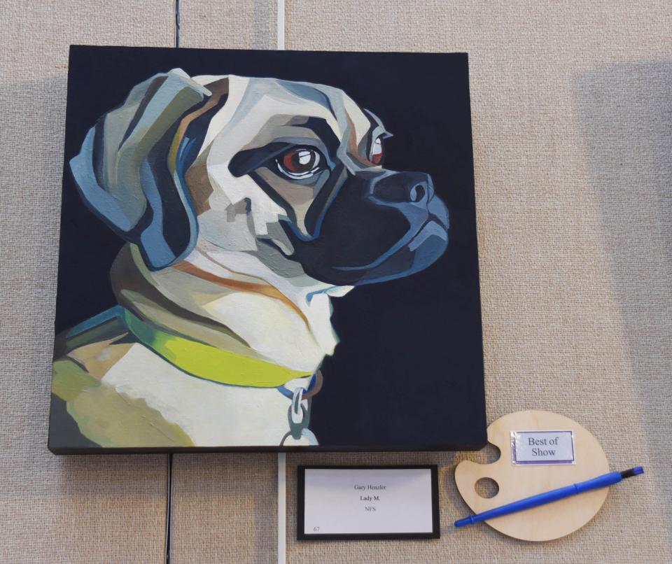 Artist Gary Henzler of Homestead won Best of Show with this oil portrait of a dog in the 
Midland Arts Council’s annual summer art show.