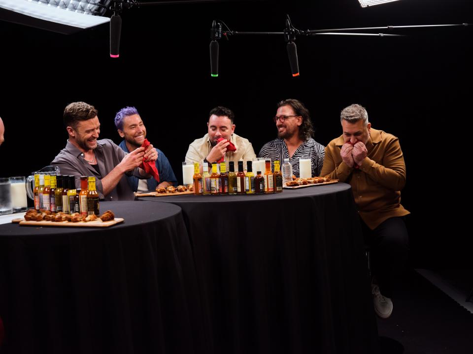 NSYNC members Joey Fatone (left), Justin Timberlake, JC Chasez, Chris Kirkpatrick and Lance Bass appear on the Sept. 21, 2023, episode of "Hot Ones."