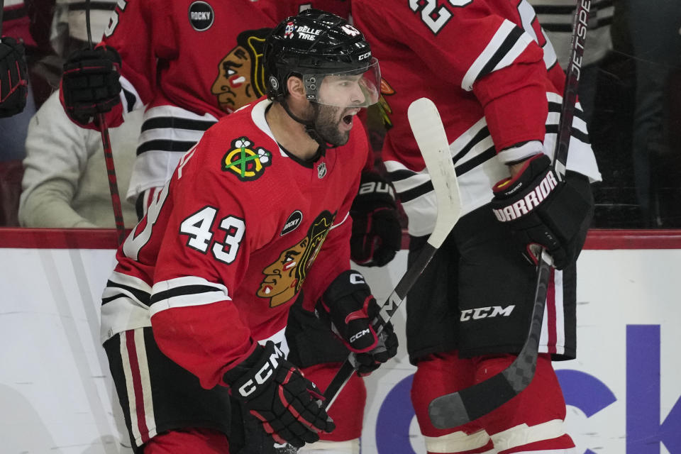 Chicago Blackhawks center Colin Blackwell celebrates his goal against the Calgary Flames during the first period of an NHL hockey game, Sunday, Jan. 7, 2024, in Chicago. (AP Photo/Erin Hooley)
