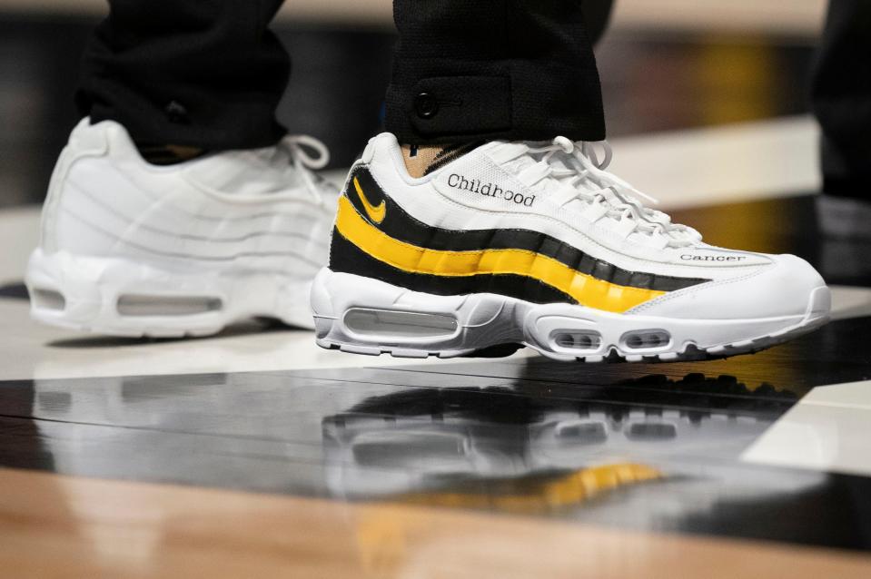 Vanderbilt head coach Jerry Stackhouse wears sneakers designed by cancer patient Jayden Bailey during the game against Kentucky at Memorial Gymnasium Tuesday, Jan. 24, 2023, in Nashville, Tenn. 