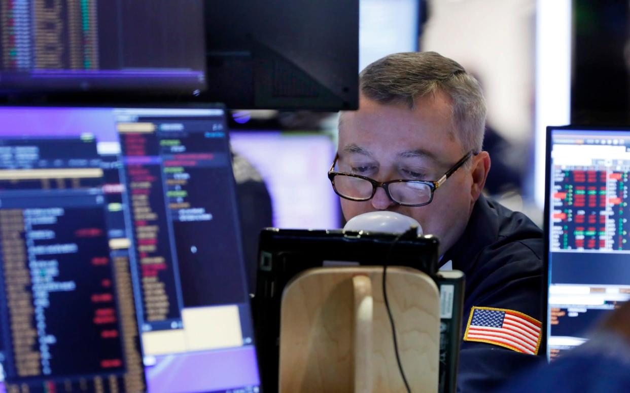 The Dow Jones dropped by almost 600 points, and the Nasdaq slid 2.2pc - AP