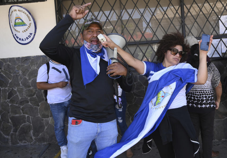 Western Democratic Movement activists protest outside the Nicaraguan embassy against President Daniel Ortega and demanding the release of political prisoners including Matagalpa Bishop Rolando Álvarez, in San Jose, Costa Rica, Monday, Feb. 20, 2023. An outspoken critic of the government, Álvarez was sentenced to 26 years in prison and stripped of his Nicaraguan citizenship on Feb. 10, the day after Ortega released and sent to the U.S. the planeload of opposition figures. (AP Photo/Carlos Gonzalez)