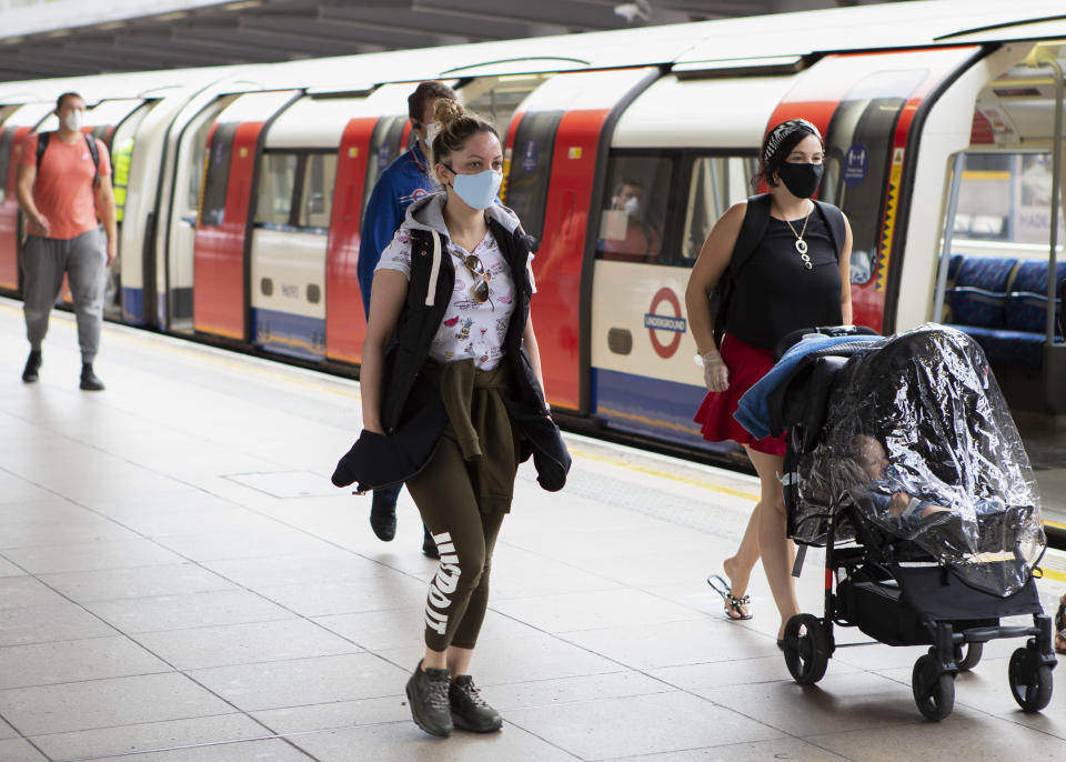 A commuter wears a protective face mask at Stratford station in London, England on June 15th 2020 - The Government enforced a new law which makes it mandatory to wear a protective face masks on all public transport to help stop the transmission of COVID-19 in the UK.   (Photo by Jacques Feeney/MI News/NurPhoto via Getty Images)