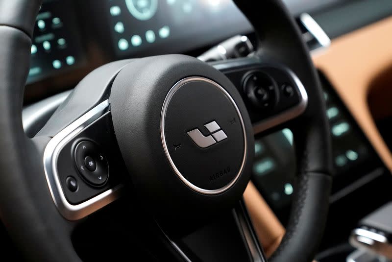 FILE PHOTO: The logo of Li Auto is seen on a steering wheel of a car at the company's showroom in Beijing