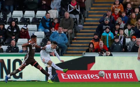 Swansea City's Bersant Celina scores their third goal  - Credit: Action Images