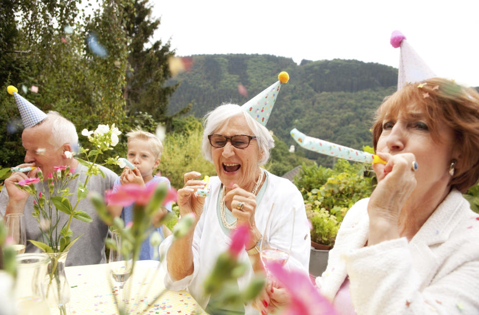 a older lady celebrating a birthday party