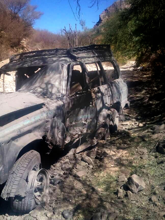 This undated photo provided by the Saleh family shows the damaged vehicle after a drone struck it with two US-made missiles, killing all seven men inside, instantly ending their lives, shredding their bodies into pieces, in Shabwa, Yemen. (Saleh family via AP)