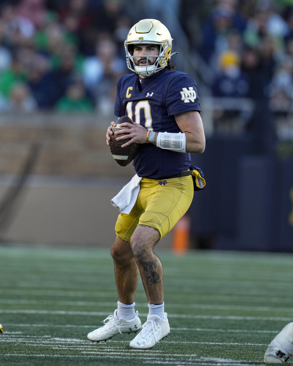 Notre Dame quarterback Sam Hartman (10) throws against Wake Forest during the first half of an NCAA college football game in South Bend, Ind., Saturday, Nov. 18, 2023. (AP Photo/Michael Conroy)