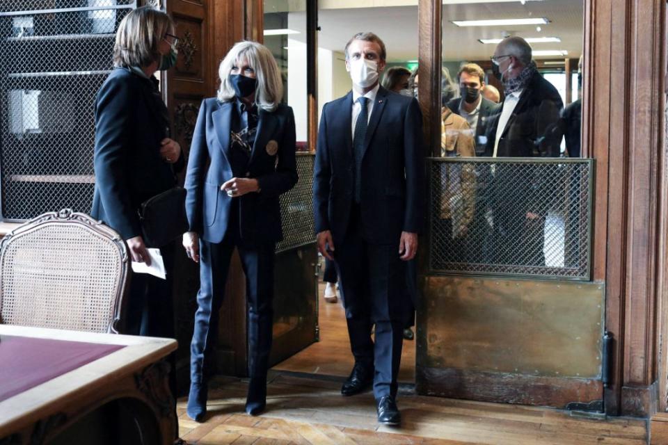 French President Emmanuel Macron and Brigitte Macron visit the Richelieu site of the Bibliotheque Nationale de France, after the completion of the renovation project and the 300th anniversary of the installation of the royal collections at the BnF, Sept. 28, 2021. - Credit: AP