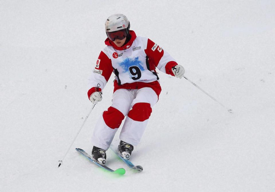 Former Olympian Maxime Dufour-Lapointe races during the Ladies Moguls qualification run at the 2017 FIS Freestyle Ski World Cup in Calgary, Alta., in 2017. Now a medical resident, Dufour-Lapointe says she's glad to see the study of female athletes' bodies getting more attention.