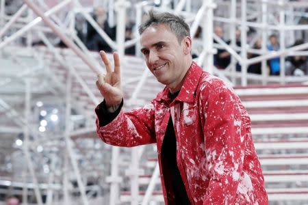 Belgian designer Raf Simons appears at the end of his Haute Couture Spring Summer 2015 fashion show for French fashion house Christian Dior in Paris January 26, 2015. REUTERS/Gonzalo Fuentes